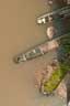 Boats under the Moa River Bridge at Daru