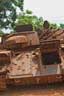 Derelict Guinean tank at Segbwema. The "For Sale" graffiti was scrawled by the AFRC.