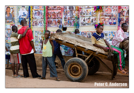 Youths check out upcoming films at the cinema.